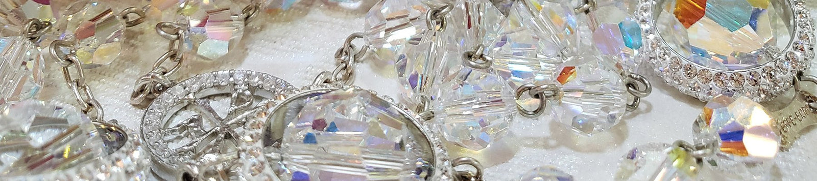 Terços de Swarovski